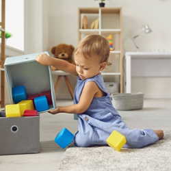 Toddler-tidying-up11 نظافت مهدکودک